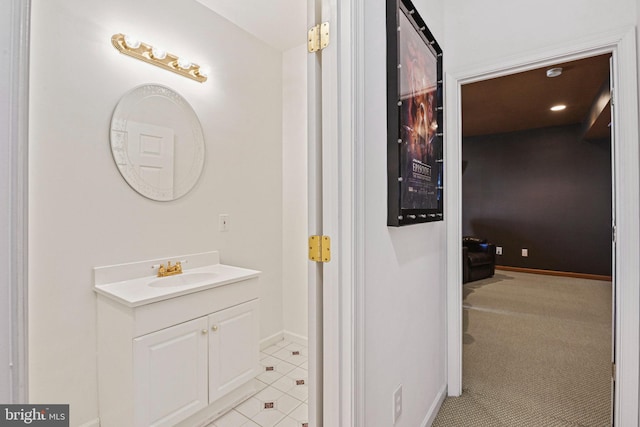 bathroom featuring vanity and baseboards