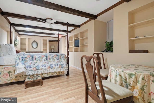 bedroom featuring beam ceiling, ceiling fan, and light hardwood / wood-style flooring