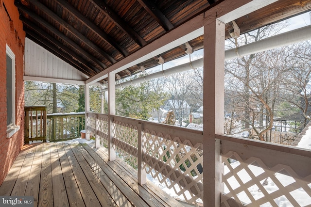 view of snow covered deck