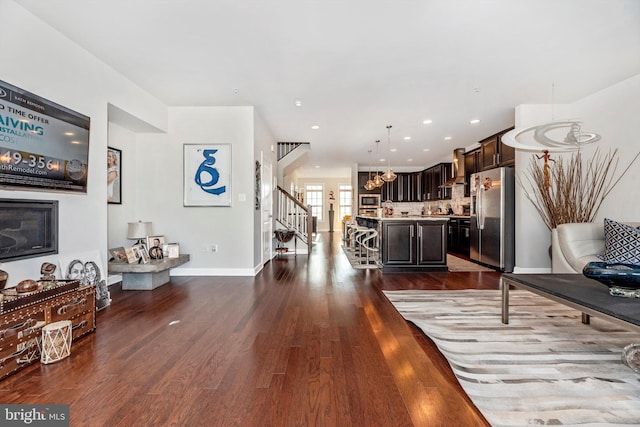 living room featuring dark hardwood / wood-style floors