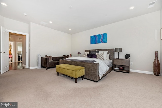 bedroom with light carpet