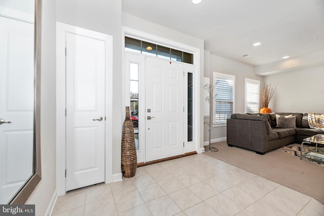 view of carpeted foyer