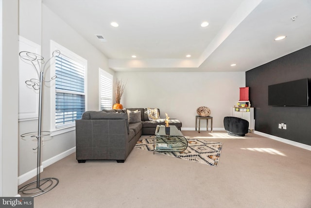 living room featuring light colored carpet