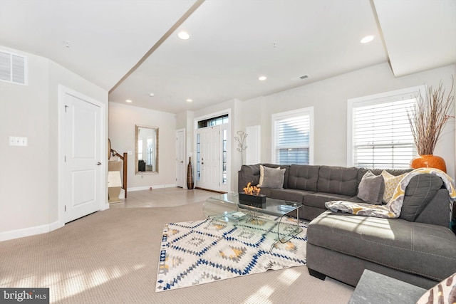 living room featuring light colored carpet