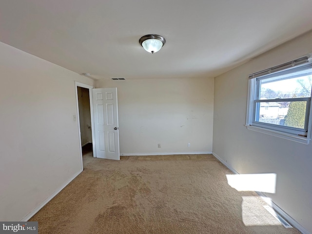 view of carpeted spare room