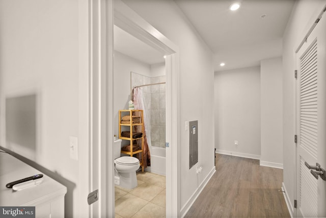 corridor featuring light wood-type flooring