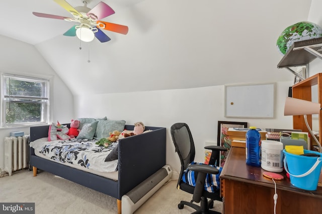 carpeted bedroom featuring lofted ceiling, ceiling fan, and radiator