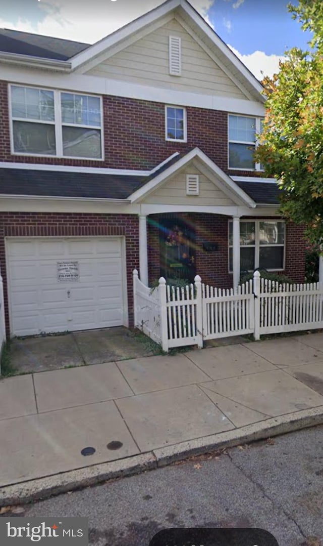 444 Manton St, Philadelphia, PA 19147 - view of front of house with a garage