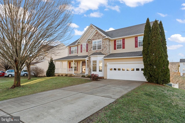 view of front of home with a garage, a front yard, and a porch