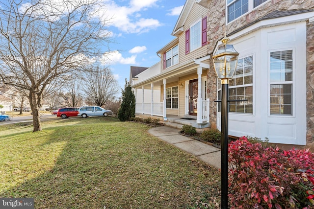 view of home's exterior with a yard