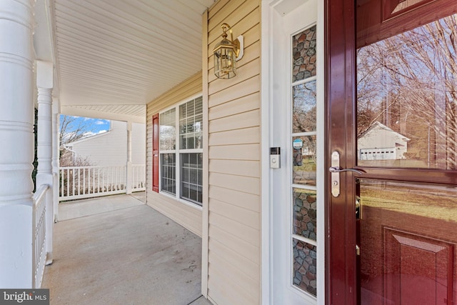 property entrance featuring covered porch