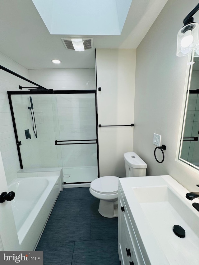 full bathroom featuring vanity, plus walk in shower, and toilet