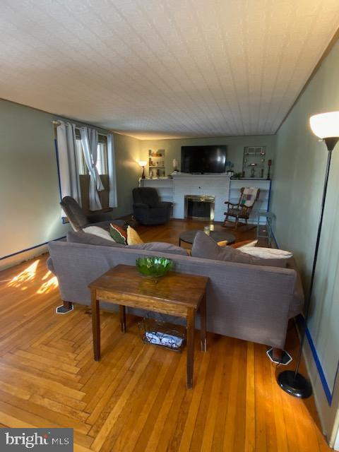 living room with hardwood / wood-style floors