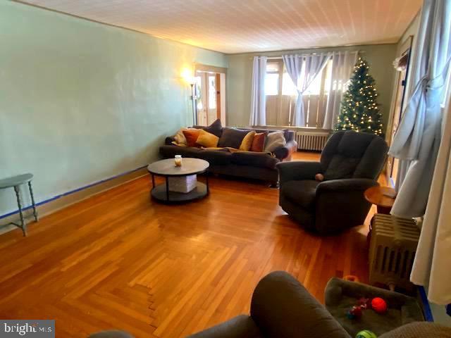 living room with parquet flooring