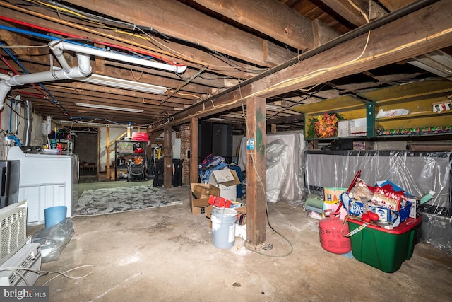 basement featuring independent washer and dryer