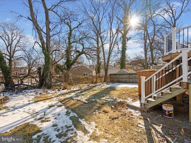 view of yard covered in snow