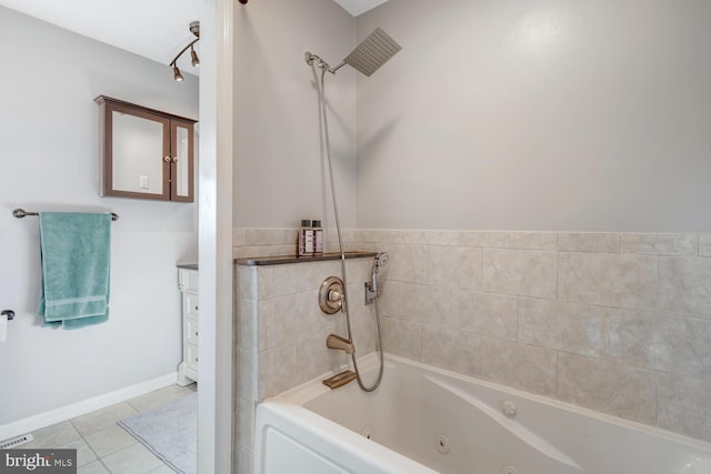 bathroom featuring bathing tub / shower combination and tile patterned flooring