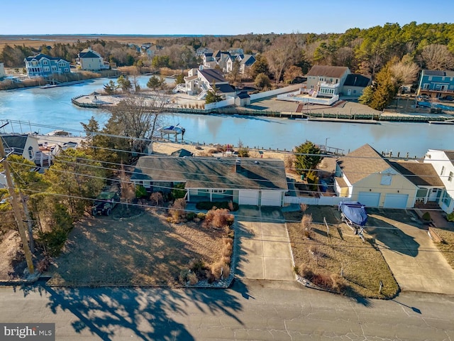 drone / aerial view featuring a water view