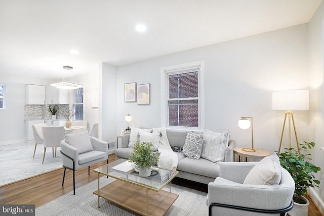 living room featuring light wood-type flooring