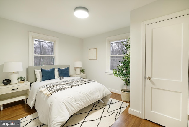 bedroom with wood-type flooring