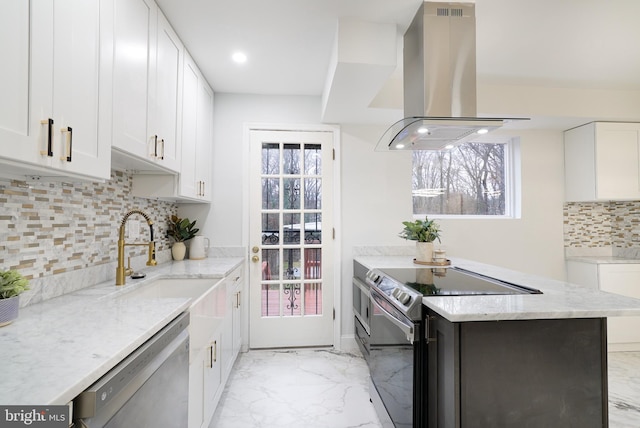 kitchen with white cabinetry, island exhaust hood, stainless steel appliances, and light stone counters