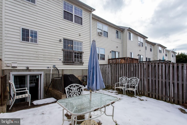 view of snow covered patio