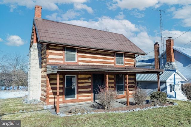 log home with a porch