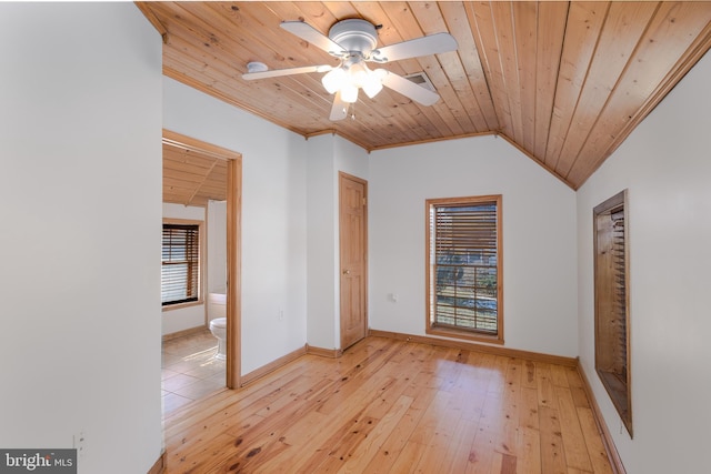 unfurnished bedroom featuring lofted ceiling, ensuite bathroom, wooden ceiling, ornamental molding, and light hardwood / wood-style floors