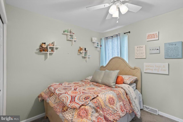 carpeted bedroom featuring ceiling fan