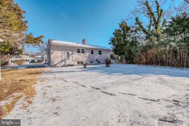 view of snow covered property