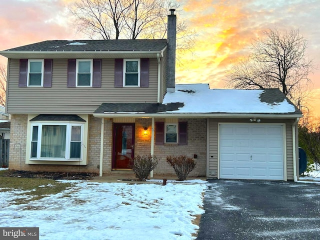 view of front of house with a garage