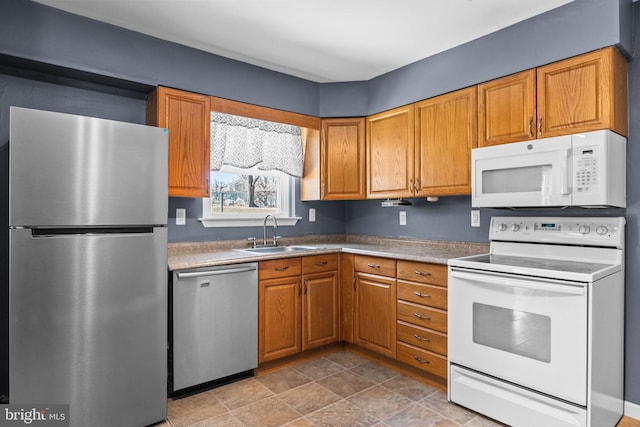 kitchen featuring stainless steel appliances and sink