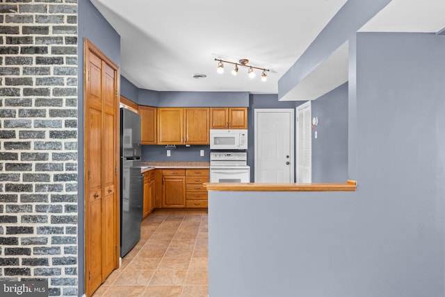 kitchen featuring white appliances