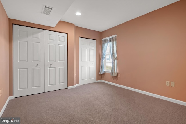 unfurnished bedroom with carpet