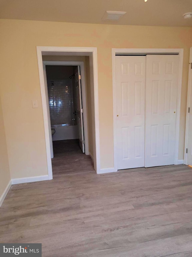 hall featuring light wood-type flooring