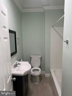 bathroom with crown molding, vanity, toilet, and hardwood / wood-style flooring