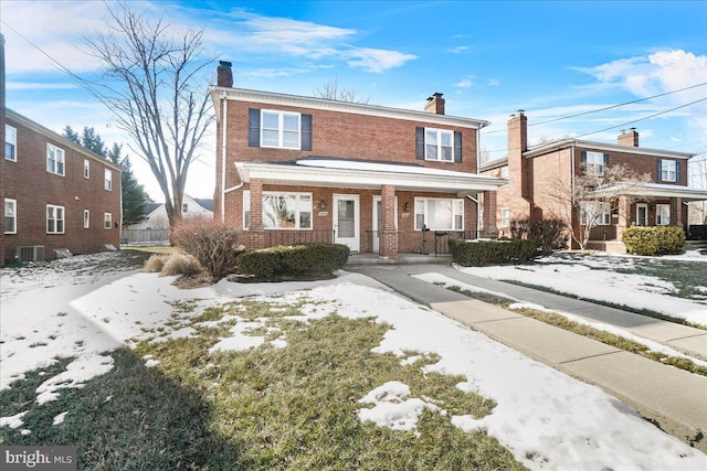 front of property featuring covered porch and central air condition unit