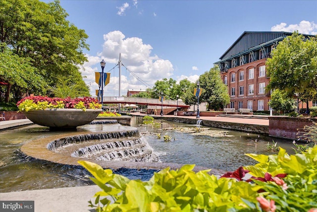 surrounding community featuring a water view