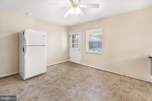 interior space featuring ceiling fan