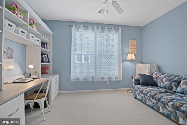 office with visible vents, baseboards, a ceiling fan, and carpet flooring