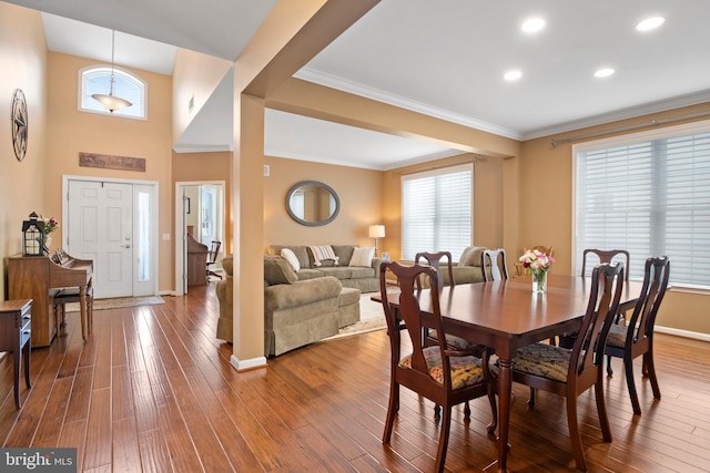 dining room with recessed lighting, baseboards, dark wood-style floors, and ornamental molding