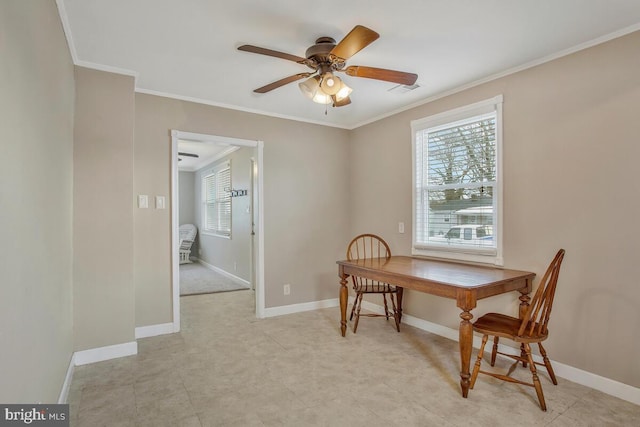 office area featuring ornamental molding, a wealth of natural light, and ceiling fan