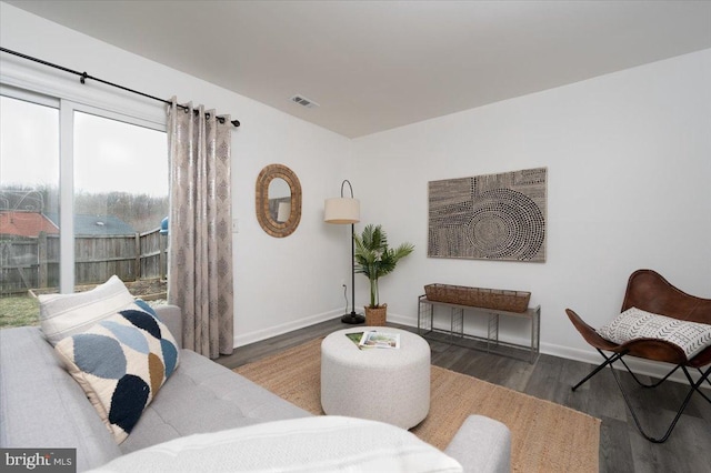 living room featuring dark hardwood / wood-style floors