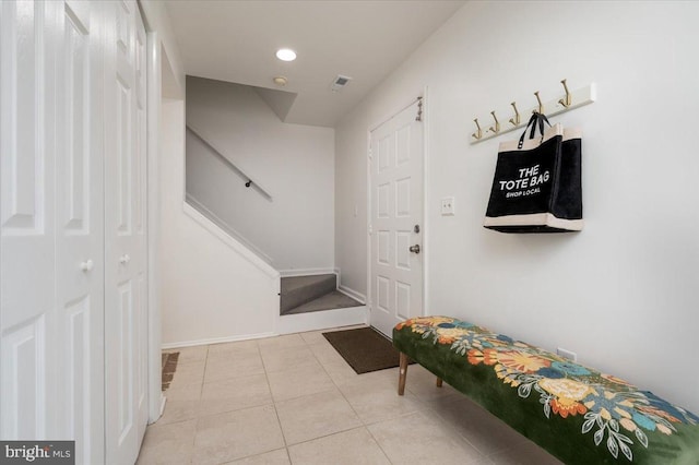 mudroom featuring light tile patterned flooring