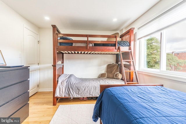 bedroom with light hardwood / wood-style floors