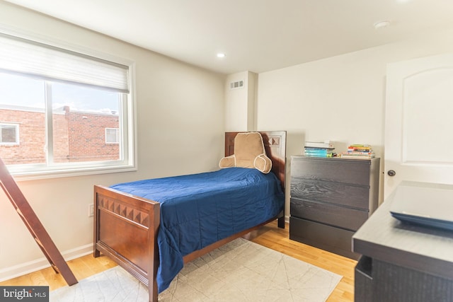 bedroom featuring light hardwood / wood-style floors