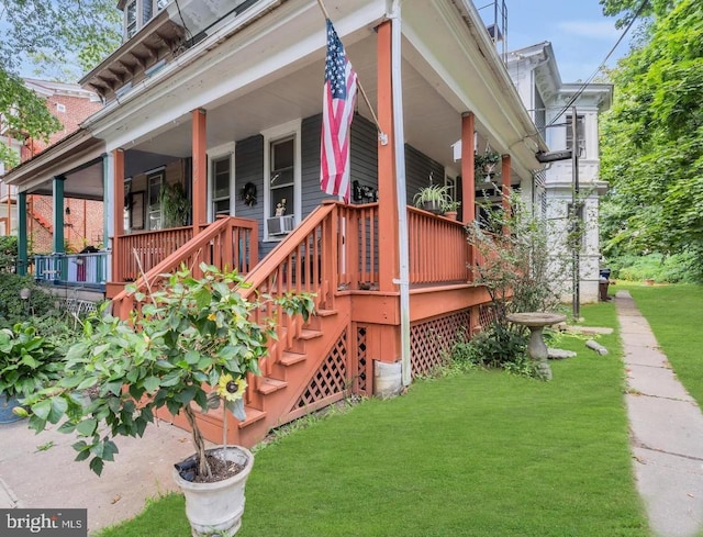 property entrance featuring cooling unit, a porch, and a yard