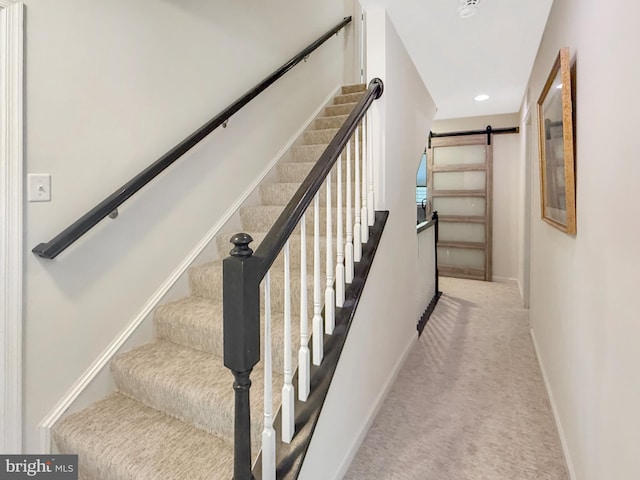 932 Still Pond Dr, Glen Burnie, MD 21060 - staircase with carpet flooring, recessed lighting, baseboards, and a barn door