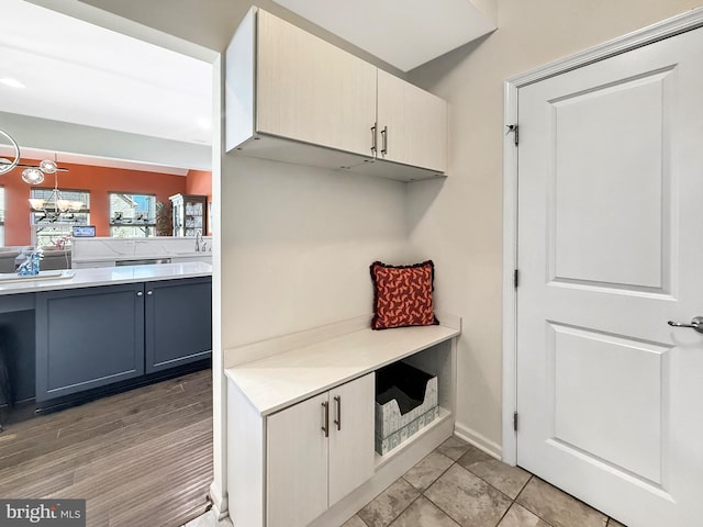 932 Still Pond Dr, Glen Burnie, MD 21060 - mudroom featuring an inviting chandelier and a sink