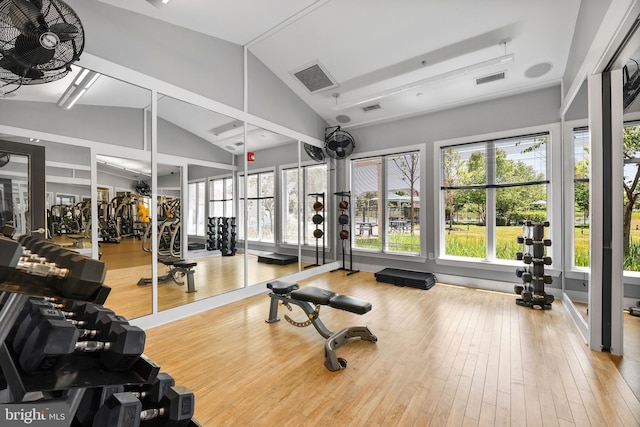 932 Still Pond Dr, Glen Burnie, MD 21060 - gym featuring visible vents, high vaulted ceiling, and hardwood / wood-style floors